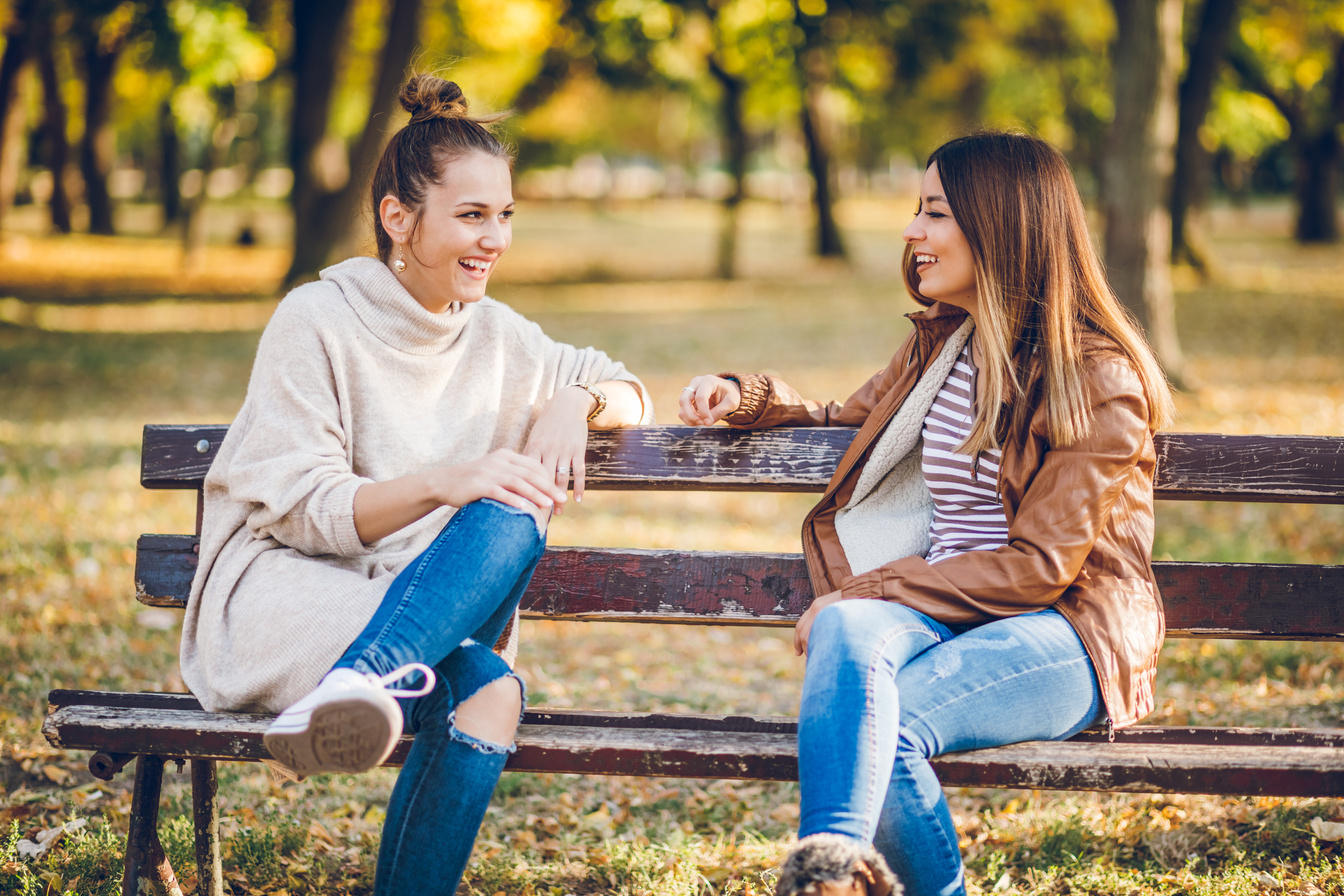 Women talking on bench